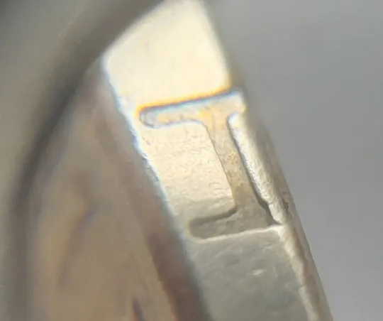 (5131) 1 гривня 2014 викрошка у букві "Н" слова "ОДНА" на гурті (1 гривна 2014 брак) З аукціону