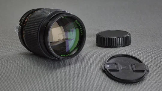 Nikon F светосильный телеобъектив Quantaray (sigma) 135mm/2,8 Ф52mm Вживане Де купити