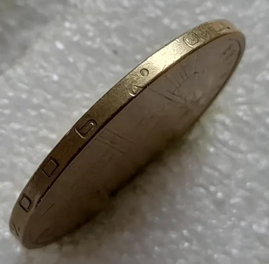 (2421) 1 гривня 2006 цікавий брак на гурті (1 гривна 2006 брак) З аукціону