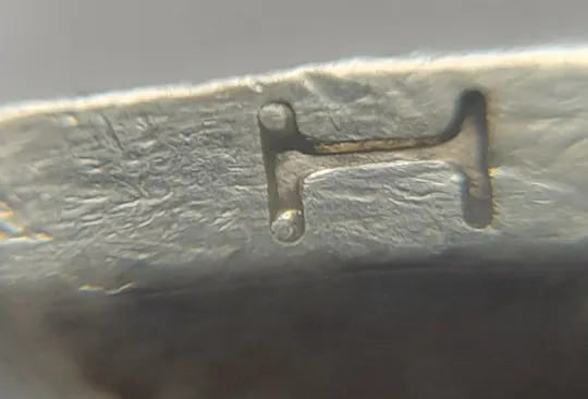 (6514) 1 гривня 2003 викрошки в букві "Н" слова "ОДНА" на гурті (1 гривна 2003 брак викришка) З аукціону