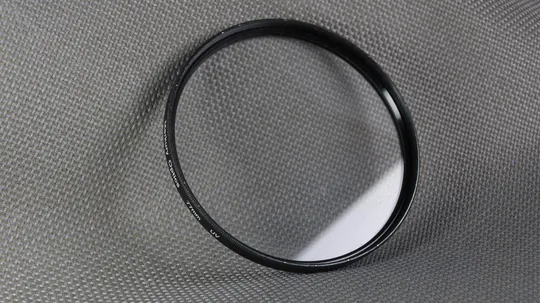 Merkury Optics  (UV) 77мм. защитный ультрафиолетовый светофильтр 100% original Вживане Ціна