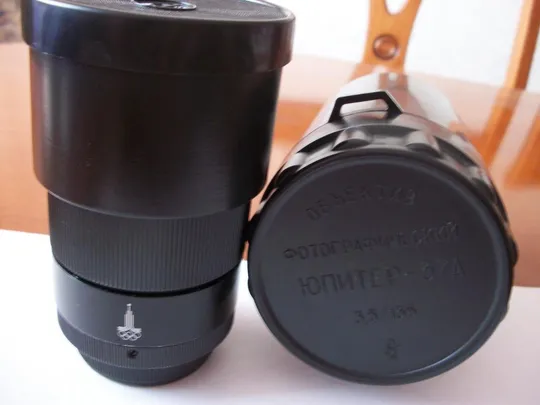 Объектив Юпитер-37А. Олимпийский. M-42, N-7913168 отличный, как нов. Бленда, крышки, футляр Цена-мин З аукціону