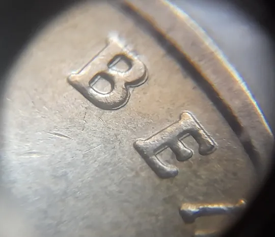 (751) 1 гривня 2006 двійний удар вправо на буквах "ВОЛОДИМИР ВЕЛИКИЙ" на реверсі /1 гривна 2006 брак З аукціону