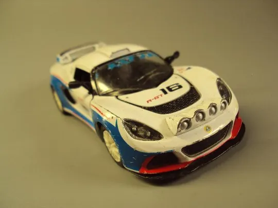 машинка 2012 Lotus exsige R-GT 16 scale 1/32 kinsmart Китай длина 12,3 см №10803 Де купити