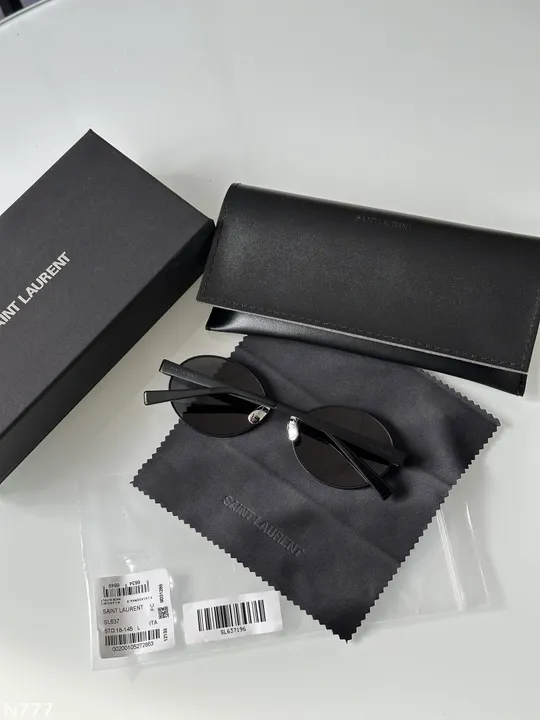 Сонцезахисні окуляри Saint Laurent SL 692 003 Black/Black M (EW0202) З аукціону