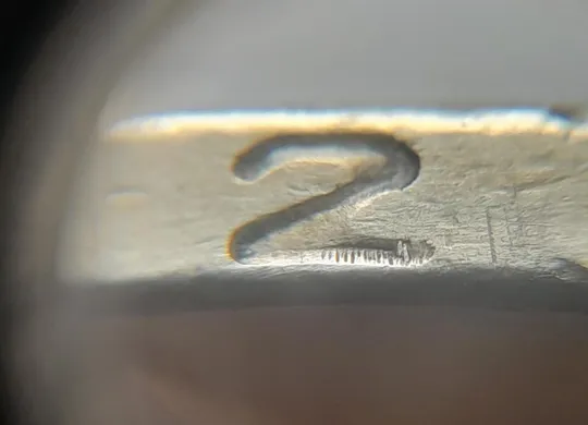 (4722) 1 гривня 2001 викрошки у "Г" слова "ГРИВНЯ" та у "2" слова "2001" на гурті (1 гривна 2001) З аукціону