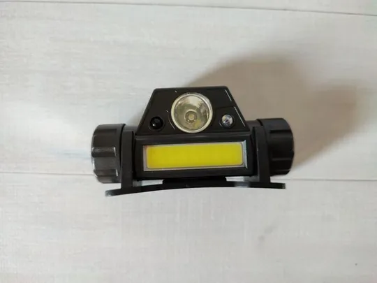 Налобный фонарь bl 1898  sensor Де купити