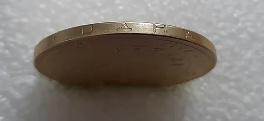 (5509) 1 гривня 2012 невелика викрошка у знаку монетного двору на аверсі (1 гривна 2012 брак) Інтернет-аукціон