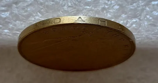 (4772) 1 гривня 2010 двійний удар вліво на буквах ВОЛОДИМИР на реверсі (1 гривна 2010 брак) Недорого