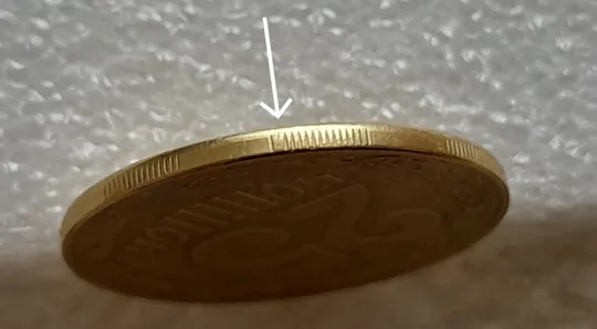 (8189) 25 копійок 2014 викрошка на гурті у сегменті на 7 год. (25 копеек 2014 брак гурта) Ціна