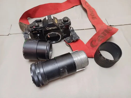0407 дзеркальна камера Canon A-1  НІМЕЧЧИНА Де купити