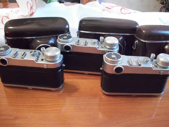 Купити 2-Два Фотоаппарат Ленинград , объектив Юпитер-8.  Футляры, ориг. крышки. Цена мин-такой сохранности
