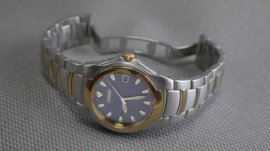 CITIZEN Eco-Drive Perpetual Calendar 100м. цельнолитая нержавейка синий циферблат model:E710-H24385T Ціна