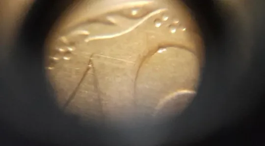 (2973) 10 копійок 2007 викрошки на реверсі на "1" та "0" (10 копеек 2007 брак) Продаж