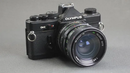 Olympus OM широкоугольний объектив Telesar MC 28mm/2.8 Auto Ф55мм Характеристики