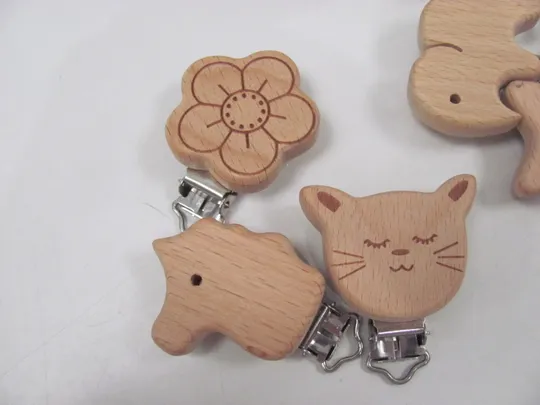 набір дерев’янич затискачів із харчового бука  для ланцюжка на одязі (8) З аукціону