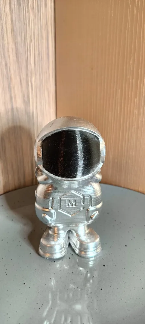 Фігурка астронавту хром З аукціону