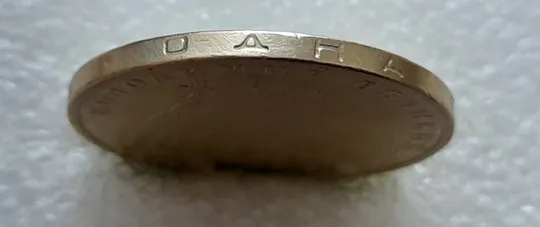 (5384) 1 гривня 2005 дві невеликі викрошки у букві &quot;Р&quot; слова &quot;ГРИВНЯ&quot; на гурті (1 гривна 2005 брак) Де купити