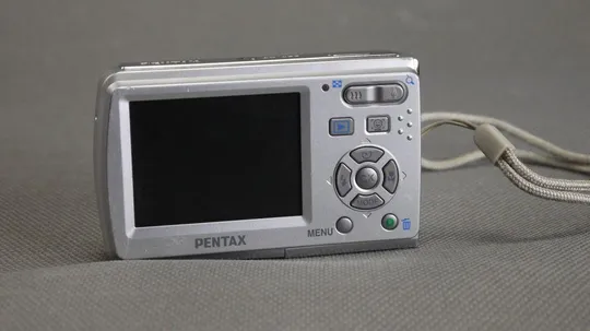 Купити Цифровой фотоаппарат 10.0Mpix Pentax Optio E60 + x3.0 Pentax lens Вживане