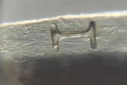 (6514) 1 гривня 2003 викрошки в букві "Н" слова "ОДНА" на гурті (1 гривна 2003 брак викришка) Ціна