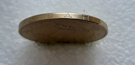 (4853) 1 гривня 2012 різновид викрошки у першій цифрі "2" слова "2012" на гурті (1 гривна 2012 брак) Де купити