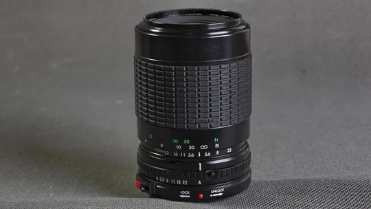Canon FD телеобъектив Sigma Zoom-KIV 70-210mm/4-5.6 MC Ф52мм для беззеркалок Sony, Olympus и др. З аукціону