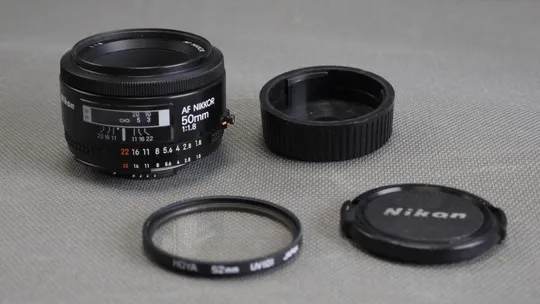 штатный объектив Nikon Nikkor AF 50mm f/1.8 Ф52mm на полный кадр 24x36mm Де купити