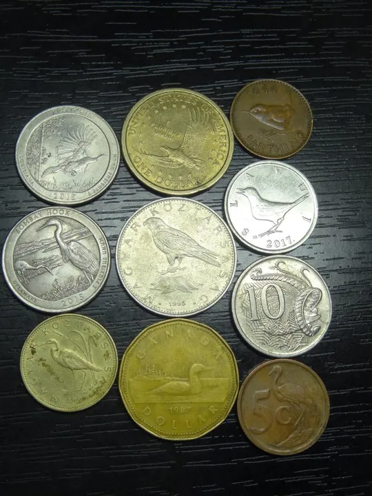 Птахи в монетах Ціна