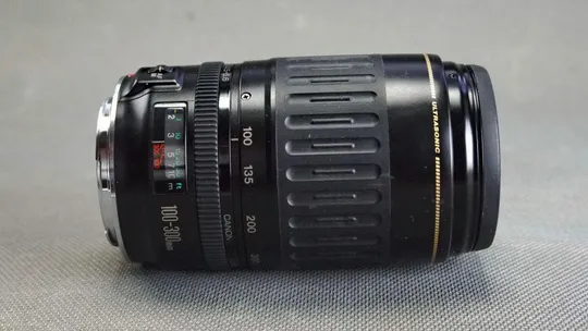 полнокадровый телеобъектив Canon EF 100-300mm/4.5-5.6 USM Ф58mm З аукціону