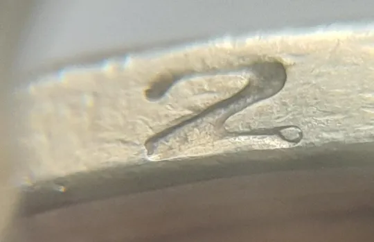 (4718) 1 гривня 2006 різновид викрошки у цифрі "2" слова "2006" на гурті (1 гривна 2006 брак) З аукціону