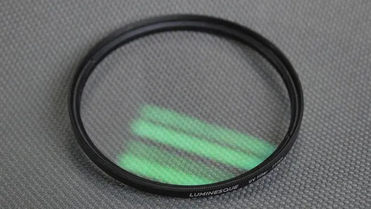 Luminesque UV MC 77мм. защитный ультрафиолетовый светофильтр 100% оригинал Japan Вживане Ціна