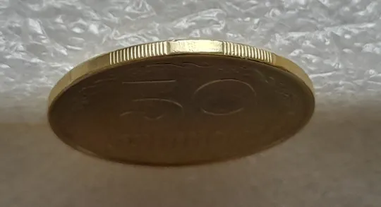 (6477) 50 копійок 1994 1.2АЕм різновид викрошок на вінку між 7 та 8 гронами(50 копеек 1994 1.2АЕм брак) Недорого