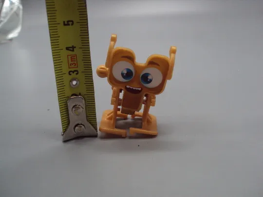 Фигурка киндер сюрприз VD203А Ferrero Robot Oro механический робот (заводится и ходит) №18606л Де купити