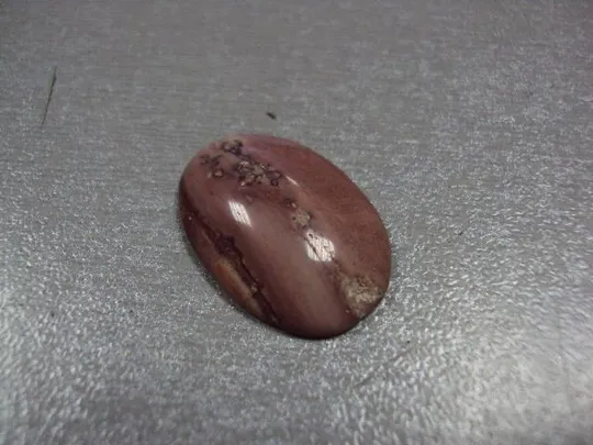 Камень яшма овальная для ювелирных изделий вес 2,71 г размер 5 х 24 х 16,5 мм №13262 Ціна