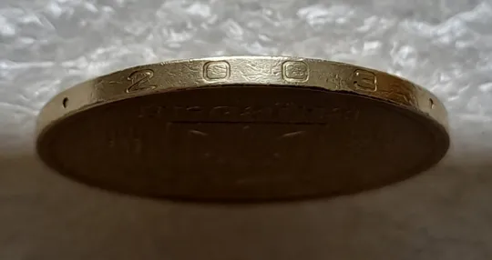 (6514) 1 гривня 2003 викрошки в букві "Н" слова "ОДНА" на гурті (1 гривна 2003 брак викришка) Недорого