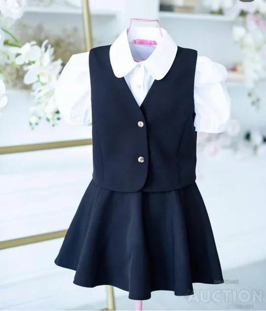 Комплект жилет та спідниця для дівчинки колір чорний Де купити