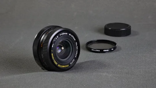 Об&#039;єктив Minolta MD широкоугольний объектив Promaster Spectrum 7 MC 28mm/2.8 Ф49мм Japan Вживане Ціна