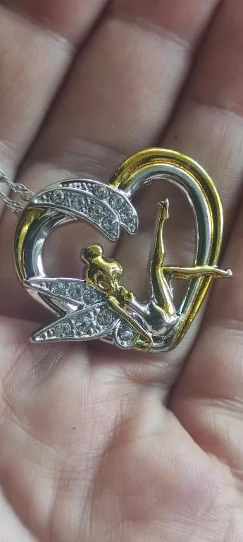 Купити необычная  женская подвеска  підвіска эльф с крылышками на сердечке ml455