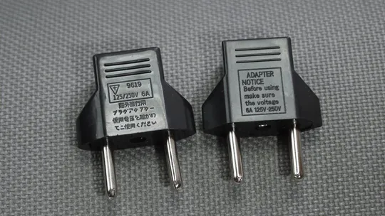 Купити 10шт. (десять) универсальные переходники сетевой адаптер US/EU америка-европа под EU розетку