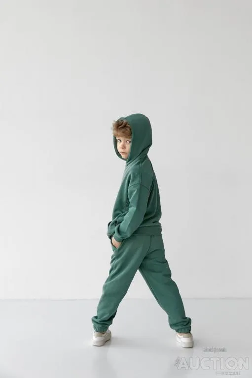 Дитячий спортивний костюм для хлопчика м'ята З аукціону