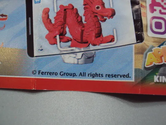Фигурка киндер сюрприз VQ111B Ferrero дракон едет №18615л Продаж