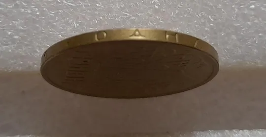 (3715) 1 гривня 2001 1АД3 брак "око змії" на гурті (1 тип), викрошка (1 гривна 2001) Де купити