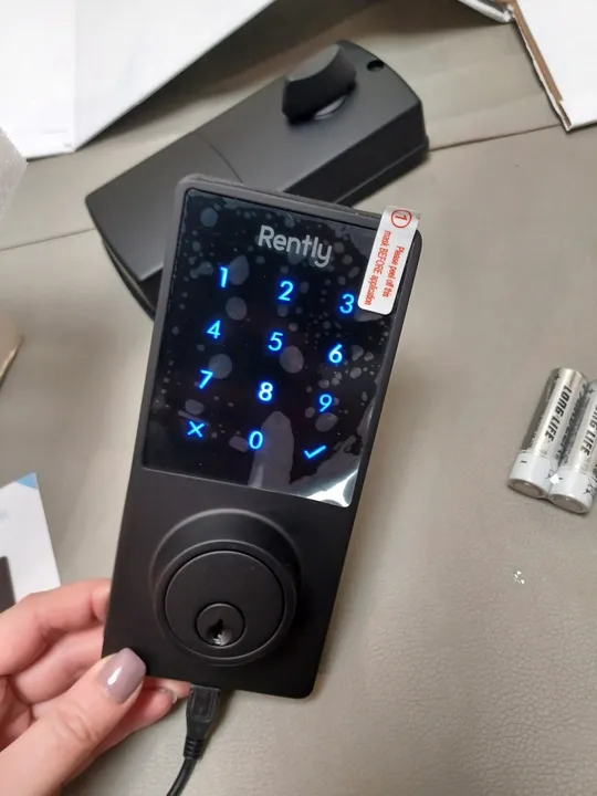 0585С  Розумний замок Rently Model RKDB03 Rev 2.1 з ключем, браслетом та ключами новий З аукціону