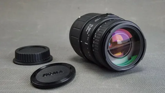 Об'єктив Canon EF телеобъектив Sigma 70-300mm 1:4-5.6 DL Macro MC Ф58mm Japan Вживане Ціна