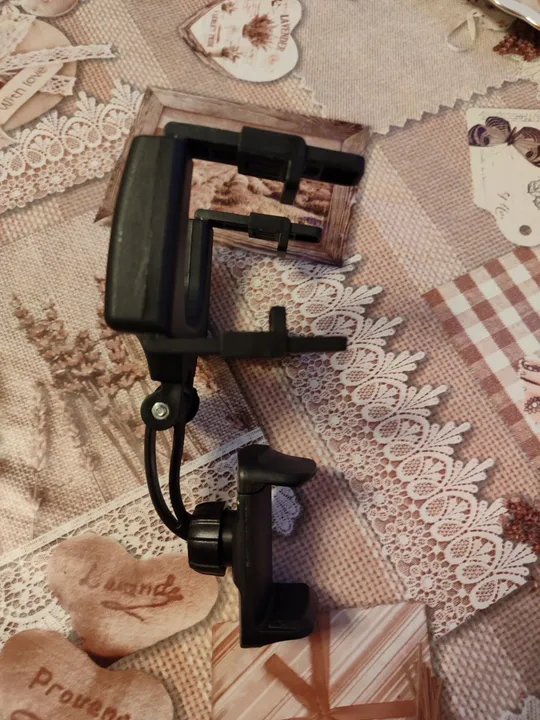 Купити Тримач для смартфонів на дзеркало заднього виду.