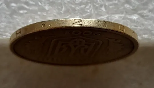Купити (7476) 1 гривня 2001 викрошка вверху &#039;2&#039; слова &#039;2001&#039; на гурті (1 гривна 2001 брак)