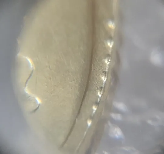 (7918) 50 копійок 1992 1АЕк сліди гурта на канті аверса + розкол від канту до щита тризуба (50 копеек 1992 след гурта, брак) Продаж