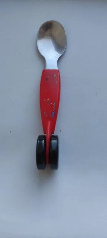 Интересный предмет-чайная ложка на колесах , td846 Де купити