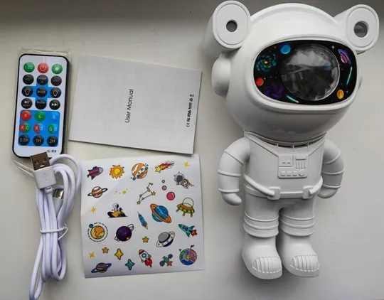 Проектор галактики лазерний астронавт, зоряне небо на стелі Продаж