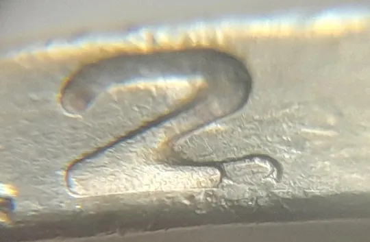 (4713) 1 гривня 2006 різновид викрошки у цифрі "2" слова "2006" на гурті (1 гривна 2006 брак) Ціна